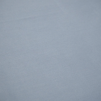 Изображение товара Простыня из сатина джинсово-синего цвета с брашинг-эффектом из коллекции Essential